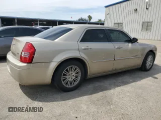 2009 Chrysler 300 LX with VIN 2C3KA43D39H553539, listed as a Copart auction lot 53302985 with 179,834 mi miles and Salvage Title. Bid and sale history available at DreamBid. Image 3.