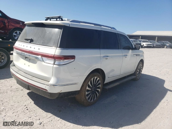 2022 Lincoln Navigator Black Label with VIN 5LMJJ2TT4NEL09900, listed as a Copart auction lot 74687794 with 0 mi miles and Salvage Title. Bid and sale history available at carsss.com. Image 3.