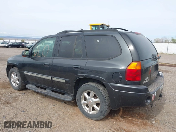 2003 GMC Envoy SLT with VIN 1GKDT13S632197541, listed as a IAAI auction lot 42178695 with 221,189 mi miles and . Bid and sale history available at DreamBid. Image 3.