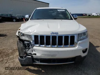 2011 Jeep Grand Cherokee Overland with VIN 1J4RR6GG3BC718723, listed as a Copart auction lot 64975275 with 272,922 mi miles and Salvage title. Bid and sale history available at DreamBid. Image 5.