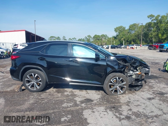 2019 Lexus RX with VIN 2T2ZZMCA4KC129338, listed as a IAAI auction lot 41866980 with 72,265 mi miles. Bid and sale history available at carsss.com. Image 14.