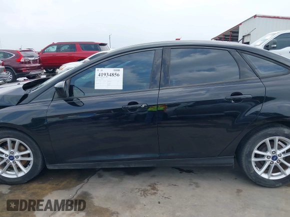 2018 Ford Focus SE with VIN 1FADP3F22JL311975, listed as a IAAI auction lot 41934856 with 68,974 mi miles. Bid and sale history available at carsss.com. Image 15.