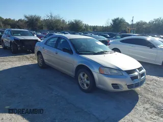 2006 Dodge Stratus SXT z VIN 1B3EL46RX6N242611, wystawiony jako IAAI lot #41595606 z przebiegiem 132 803 mil mil oraz . Historia ofert i sprzedaży dostępna na DreamBid. Obrazek 1.