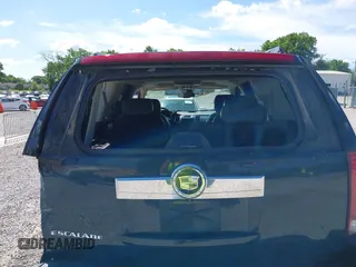 2007 Cadillac Escalade z VIN 1GYFK63827R347144, wystawiony jako IAAI lot #42265376 z przebiegiem 240 898 mil mil oraz . Historia ofert i sprzedaży dostępna na DreamBid. Obrazek 13.