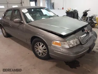 2003 Ford Crown Victoria LX with VIN 2FAFP74W83X168347, listed as a IAAI auction lot 41715018 with NaN miles. Bid and sale history available at carsss.com. Image 1.