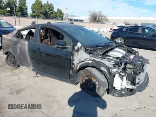 2022 Toyota Prius L Eco with VIN JTDKAMFU0N3161123, listed as a IAAI auction lot 41319184 with Not Provided miles and . Bid and sale history available at DreamBid. Image 1.