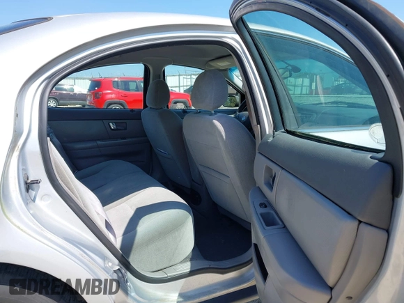 2003 Mercury Sable GS z VIN 1MEFM50213A611357, wystawiony jako IAAI lot #42142256 z przebiegiem 170 396 mil mil oraz . Historia ofert i sprzedaży dostępna na DreamBid. Obrazek 8.