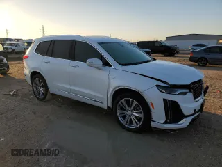 2023 Cadillac XT6 FWD Premium Luxury z VIN 1GYKPCRS5PZ120905, wystawiony jako Copart lot #48533775 z przebiegiem 30 694 mil mil oraz Szkoda całkowita • Salvage title. Historia ofert i sprzedaży dostępna na DreamBid. Obrazek 4.