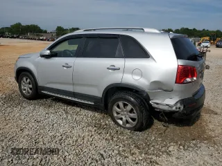 2013 Kia Sorento LX with VIN 5XYKT4A24DG339500, listed as a Copart auction lot 56302605 with 166,733 mi miles and Salvage title. Bid and sale history available at DreamBid. Image 2.