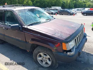 1997 Jeep Grand Cherokee Laredo with VIN 1J4GZ58S0VC708420, listed as a IAAI auction lot 42624603 with Not provided miles and . Bid and sale history available at DreamBid. Image 6.