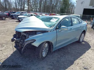 2014 Ford Fusion SE Hybrid with VIN 3FA6P0LU0ER304804, listed as a IAAI auction lot 41817607 with 202,590 mi miles. Bid and sale history available at carsss.com. Image 2.