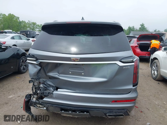 2021 Cadillac XT6 Sport with VIN 1GYKPGRS6MZ128112, listed as a IAAI auction lot 42415342 with 57,680 mi miles and . Bid and sale history available at DreamBid. Image 16.