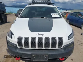 2017 Jeep Cherokee Trailhawk L Plus z VIN 1C4PJMBS9HD238905, wystawiony jako IAAI lot #42381268 z przebiegiem 130 535 mil mil oraz . Historia ofert i sprzedaży dostępna na DreamBid. Obrazek 13.