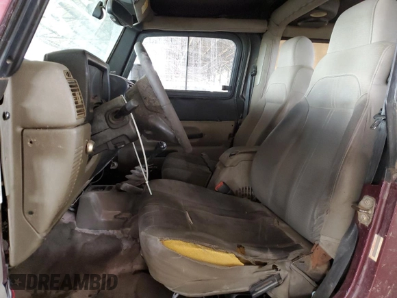 2003 Jeep Wrangler Sahara with VIN 1J4FA59S03P336844, listed as a Copart auction lot 49290345 with 167,726 mi miles and Salvage title. Bid and sale history available at DreamBid. Image 7.