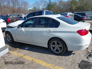 2013 BMW 3 Series 320i with VIN WBA3B1C56DF462549, listed as a IAAI auction lot 41411287 with 119,146 mi miles. Bid and sale history available at carsss.com. Image 14.