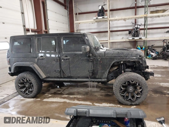 2015 Jeep Wrangler Unlimited Sahara with VIN 1C4BJWEG6FL688382, listed as a IAAI auction lot 41620621 with 138,119 mi miles. Bid and sale history available at carsss.com. Image 14.