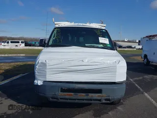 2013 Ford Econoline Cargo Commercial with VIN 1FTNE2EL1DDB27599, listed as a IAAI auction lot 41878865 with 179,802 mi miles and . Bid and sale history available at DreamBid. Image 6.