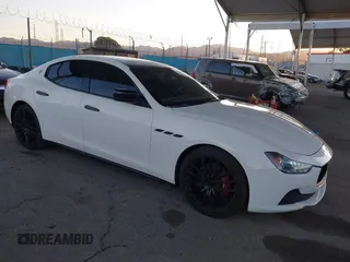 2016 Maserati Ghibli S z VIN ZAM57RSA4G1174956, wystawiony jako IAAI lot #41755343 z przebiegiem 69 769 mil mil oraz . Historia ofert i sprzedaży dostępna na DreamBid. Obrazek 1.