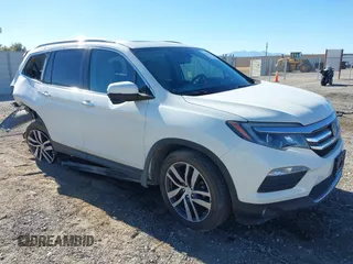 2018 Honda Pilot Touring z VIN 5FNYF6H98JB032821, wystawiony jako IAAI lot #41012077 z przebiegiem 110 321 mil mil oraz . Historia ofert i sprzedaży dostępna na DreamBid. Obrazek 1.