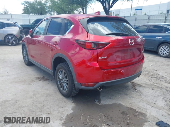 2019 Mazda CX-5 Touring with VIN JM3KFACM6K1549234, listed as a IAAI auction lot 42036633 with 85,065 mi miles and . Bid and sale history available at carsss.com. Image 3.