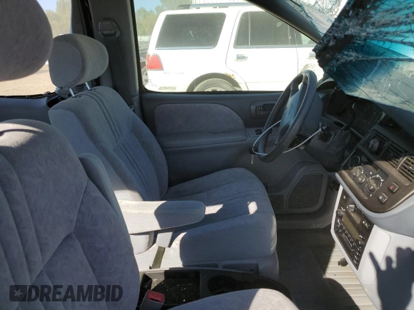 2000 Toyota Sienna LE with VIN 4T3ZF13C5YU287280, listed as a Copart auction lot 71397554 with 162,851 mi miles and Clean Title. Bid and sale history available at carsss.com. Image 7.