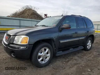 2004 GMC Envoy SLT z VIN 1GKDT13S042406662, wystawiony jako Copart lot #50523855 z przebiegiem 62 122 mil mil oraz Czysty tytuł • Clean title. Historia ofert i sprzedaży dostępna na DreamBid. Obrazek 1.