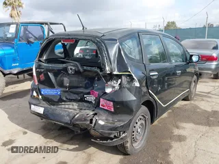 2010 Honda Fit with VIN JHMGE8H21AC039375, listed as a IAAI auction lot 42126138 with 123,077 mi miles. Bid and sale history available at carsss.com. Image 4.
