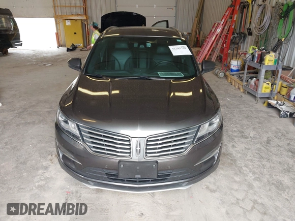 2018 Lincoln MKC Reserve with VIN 5LMCJ3D96JUL14629, listed as a IAAI auction lot 42595730 with 89,587 mi miles and . Bid and sale history available at DreamBid. Image 12.