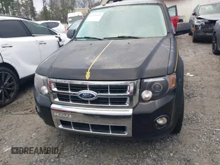 2010 Ford Escape Limited z VIN 1FMCU0EG0AKC63470, wystawiony jako IAAI lot #41198945 z przebiegiem 198 301 mil mil oraz . Historia ofert i sprzedaży dostępna na DreamBid. Obrazek 12.