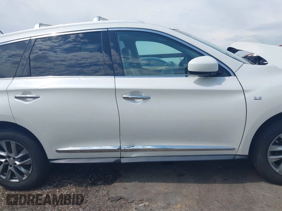 2015 Infiniti QX60 with VIN 5N1AL0MN4FC500411, listed as a IAAI auction lot 41877149 with 118,306 mi miles and . Bid and sale history available at DreamBid. Image 13.