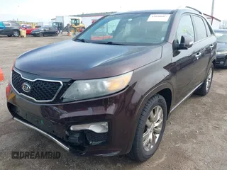 2012 Kia Sorento SX with VIN 5XYKW4A2XCG187647, listed as a IAAI auction lot 42020667 with 210,689 mi miles. Bid and sale history available at carsss.com. Image 6.