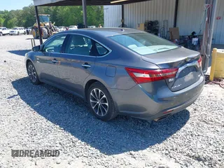 2016 Toyota Avalon Limited with VIN 4T1BK1EB4GU208979, listed as a IAAI auction lot 42032374 with 242,738 mi miles and . Bid and sale history available at carsss.com. Image 3.