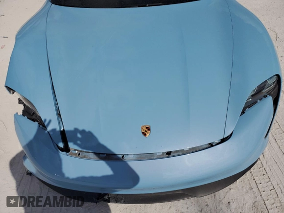 2024 Porsche Taycan z VIN WP0AA2Y17RSA10720, wystawiony jako Copart lot #50988475 z przebiegiem 2 836 mil mil oraz Szkoda całkowita • Salvage title. Historia ofert i sprzedaży dostępna na DreamBid. Obrazek 11.
