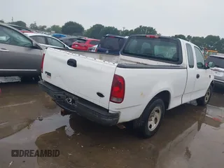 2003 Ford F-150 XL with VIN 1FTRX17W93NA21004, listed as a IAAI auction lot 42178351 with 130,686 mi miles and . Bid and sale history available at DreamBid. Image 4.