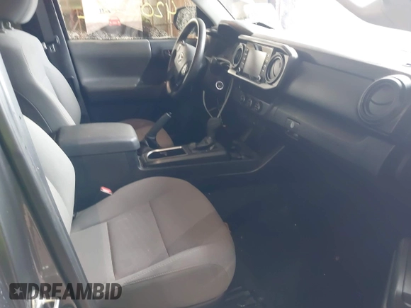 2020 Toyota Tacoma SR with VIN 3TYRX5GN5LT005461, listed as a IAAI auction lot 42020692 with 71,548 mi miles and . Bid and sale history available at DreamBid. Image 5.