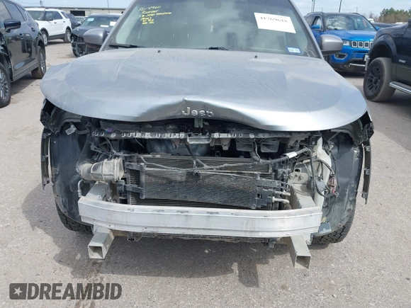 2018 Jeep Compass Latitude z VIN 3C4NJDBBXJT180665, wystawiony jako IAAI lot #41769618 z przebiegiem 128 309 mil mil oraz . Historia ofert i sprzedaży dostępna na DreamBid. Obrazek 6.