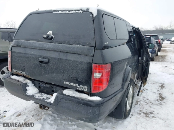 2011 Honda Ridgeline RTS with VIN 5FPYK1F48BB005889, listed as a IAAI auction lot 41268938 with 146,974 mi miles. Bid and sale history available at carsss.com. Image 4.