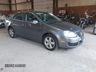2008 Volkswagen Jetta SE z VIN 3VWRZ71K68M156667, wystawiony jako IAAI lot #42540087 z przebiegiem 75 659 mil mil oraz . Historia ofert i sprzedaży dostępna na DreamBid. Obrazek 1.
