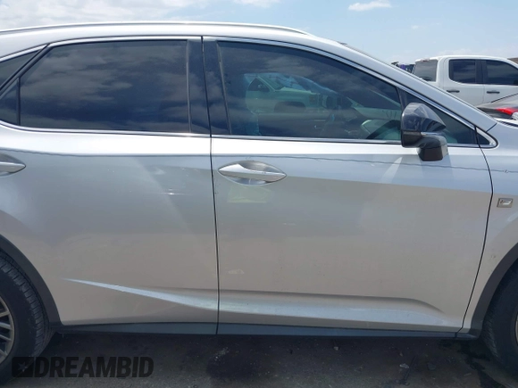 2018 Lexus RX 350 with VIN 2T2BZMCA4JC163019, listed as a IAAI auction lot 42033459 with 96,586 mi miles and . Bid and sale history available at DreamBid. Image 13.
