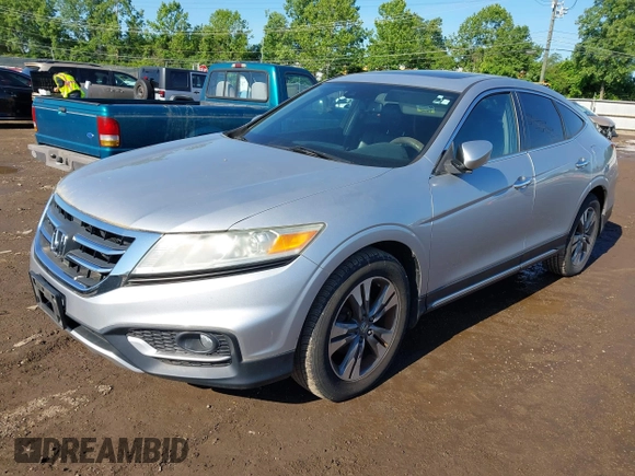 2013 Honda Crosstour EX-L z VIN 5J6TF2H56DL002499, wystawiony jako IAAI lot #42349382 z przebiegiem 174 542 mil mil oraz . Historia ofert i sprzedaży dostępna na DreamBid. Obrazek 2.