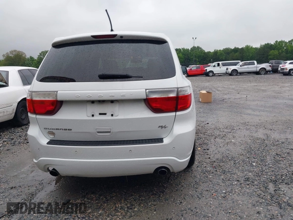 2013 Dodge Durango R/T with VIN 1C4SDHCT6DC672487, listed as a IAAI auction lot 42242172 with 185,074 mi miles and . Bid and sale history available at DreamBid. Image 16.