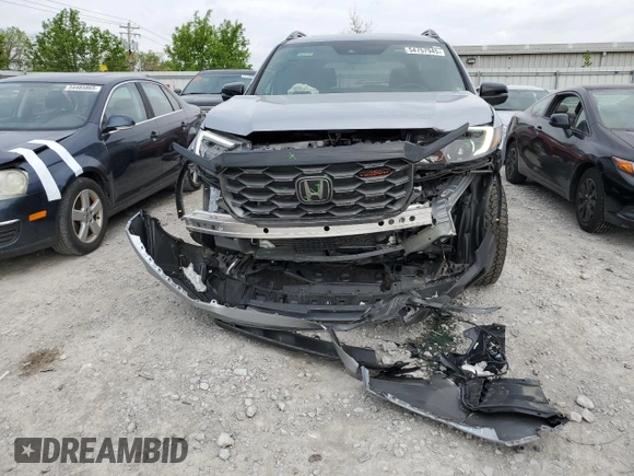 2024 Honda Passport TrailSport z VIN 5FNYF8H65RB001572, wystawiony jako Copart lot #54757945 z przebiegiem 18 872 mil mil oraz Szkoda całkowita • Salvage title. Historia ofert i sprzedaży dostępna na DreamBid. Obrazek 5.