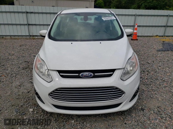 2016 Ford C-Max Energi SEL with VIN 1FADP5CUXGL117043, listed as a Copart auction lot 63949323 with 86,944 mi miles. Bid and sale history available at carsss.com. Image 5.