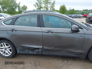 2016 Ford Fusion SE z VIN 3FA6P0HD9GR164473, wystawiony jako IAAI lot #42321315 z przebiegiem 120 005 mil mil oraz . Historia ofert i sprzedaży dostępna na DreamBid. Obrazek 12.