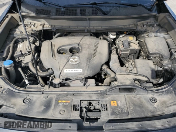 2020 Mazda CX-9 Touring z VIN JM3TCBCY3L0417755, wystawiony jako Copart lot #54497465 z przebiegiem 64 055 mil mil oraz Szkoda całkowita • Salvage title. Historia ofert i sprzedaży dostępna na DreamBid. Obrazek 12.