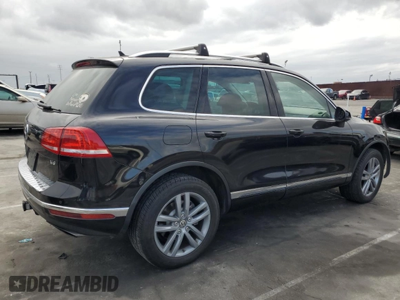 2016 Volkswagen Touareg Sport с VIN WVGEF9BP3GD011138, выставлен на аукционе Copart как лот 53557195 с пробегом 75 825 миль миль и Списание • Salvage title. История ставок и продаж доступна на DreamBid. Изображение 3.