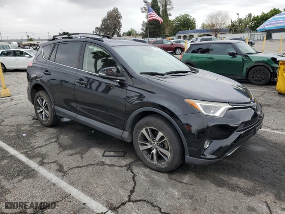 2018 Toyota RAV4 XLE with VIN 2T3WFREV8JW451241, listed as a Copart auction lot 48795135 with 92,208 mi miles and Salvage Title. Bid and sale history available at carsss.com. Image 4.