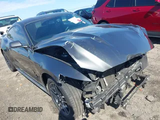 2016 Ford Mustang EcoBoost z VIN 1FA6P8TH7G5259089, wystawiony jako IAAI lot #42048289 z przebiegiem 108 752 mil mil oraz . Historia ofert i sprzedaży dostępna na DreamBid. Obrazek 18.