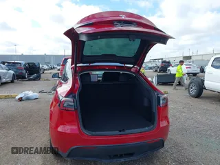 2020 Tesla Model Y Long Range with VIN 5YJYGDEE9LF009957, listed as a IAAI auction lot 41780248 with 31,053 mi miles and . Bid and sale history available at DreamBid. Image 20.