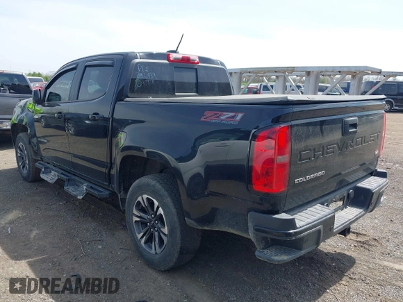 2021 Chevrolet Colorado 4WD Z71 z VIN 1GCGTDEN1M1256939, wystawiony jako IAAI lot #42071364 z przebiegiem 38 972 mil mil oraz . Historia ofert i sprzedaży dostępna na DreamBid. Obrazek 3.